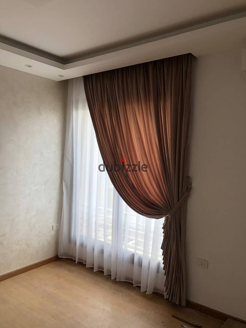 apartment in vgk compound palm hills for rent with kitchen and AC'S view pool and landscape new cairo 6