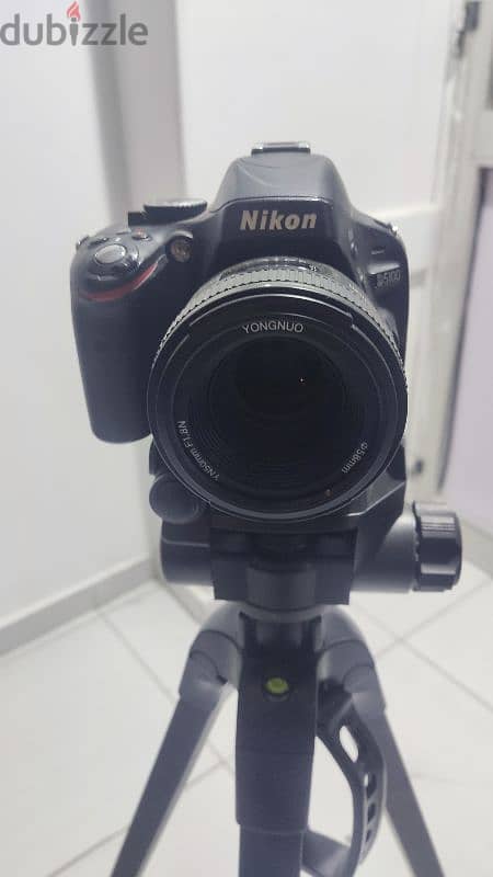 Nikon D5100 with 50mm and 18-55 lens 4