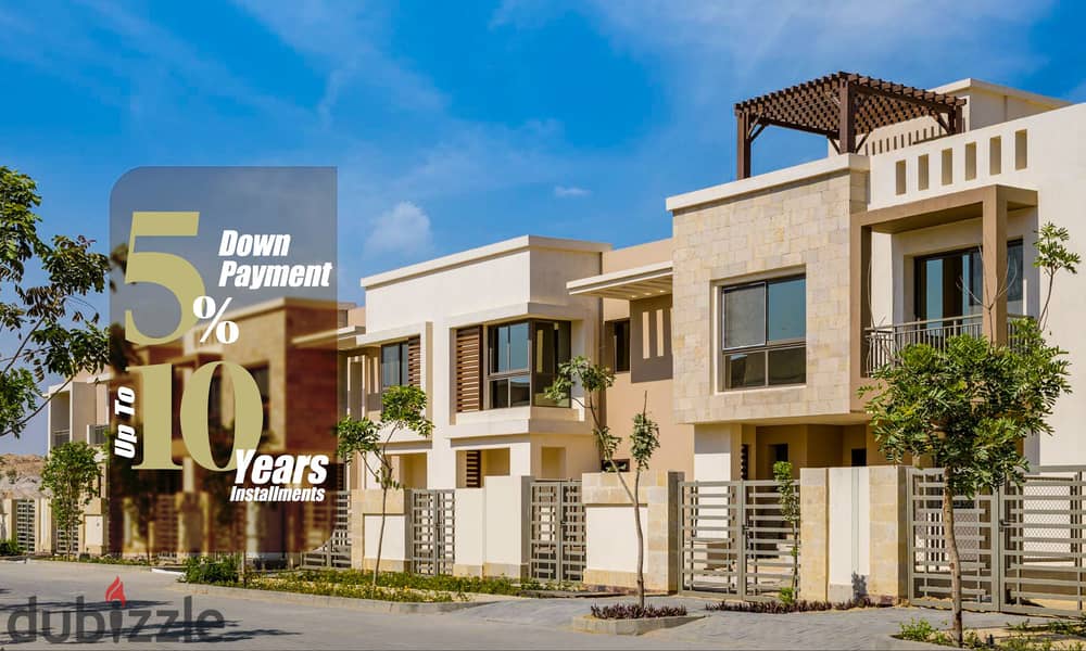 شقة دور ارضي بحديقة  في مرحله الجديده Orgiami Apartments Taj City 1