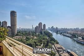 For sale, a wonderful Nile hotel apartment, immediate receipt, fully finished, with air conditioners, furnishings + appliances, in Rive de Nile Towers 0