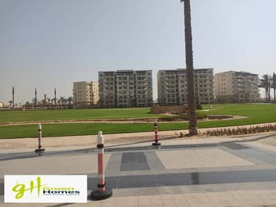 Apartment With Garden  For sale  Fully Finished kitchen with Ac Ready to move at Uptown Cairo Compound, Mokattam