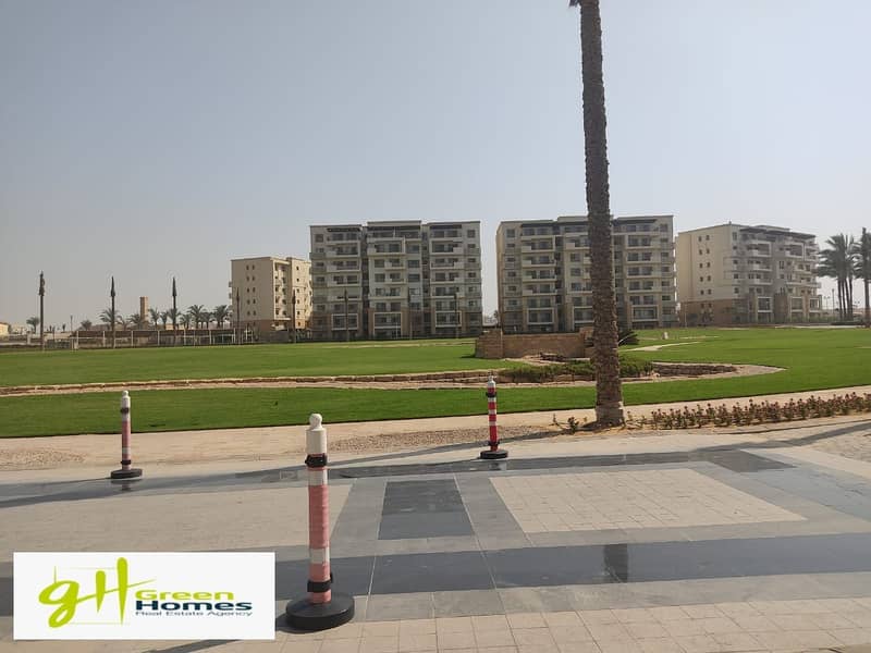 Apartment With Garden  For sale  Fully Finished kitchen with Ac Ready to move at Uptown Cairo Compound, Mokattam 0