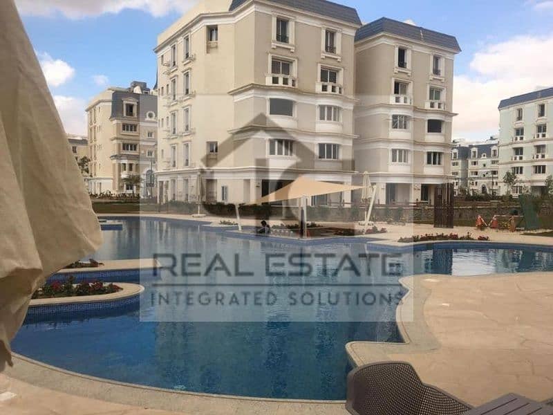 With the lowest down payment and installments, a 165 sqm double view apartment, one year’s receipt, in Mountain View iCity Compound 0