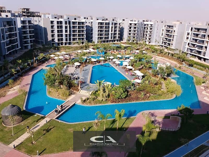 Two-bedroom apartment for sale with a pool view, immediate delivery In Sun Capital, the heart of October With a 10% down payment and equal installment 1