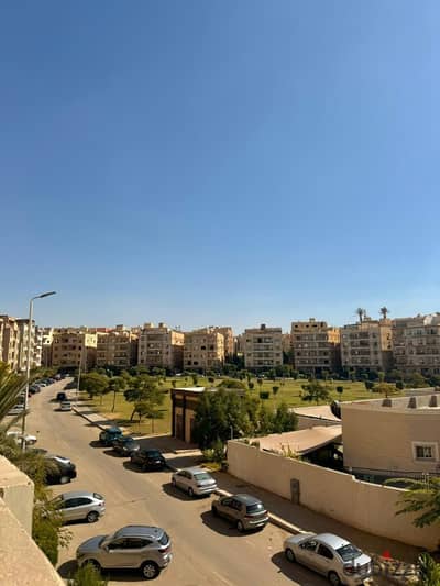 Second-floor apartment for sale by the owner in Al-Narges Buildings - 5th settlement- New Cairo - Garden View