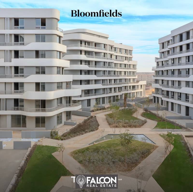 2 BR apartment with garden fully finished, delivery soon, with a 10% discount in a prime location in the Sixth Settlement, near the AUC in bloomfields 8