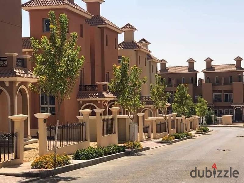 Twin house behind Mall of Arabia at a great price with a fantastic view in Nyoum compound. 21