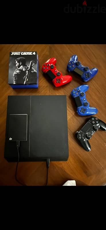 Ps4 500gb + 4 original controllers + 1 tb external drive + 5 games