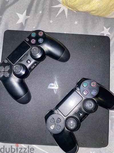 PlayStation 4 slim with 2 controllers orginal