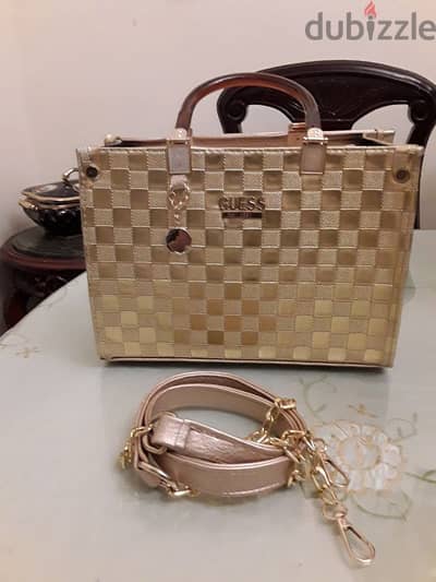 guess bag mirror