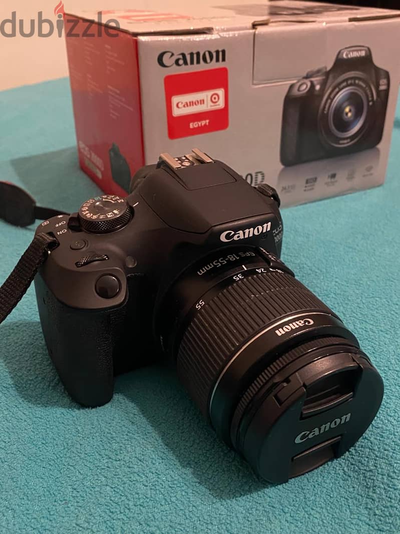 Canon EOS 2000D with zoom lens EF-S 18-55mm kit lens 1