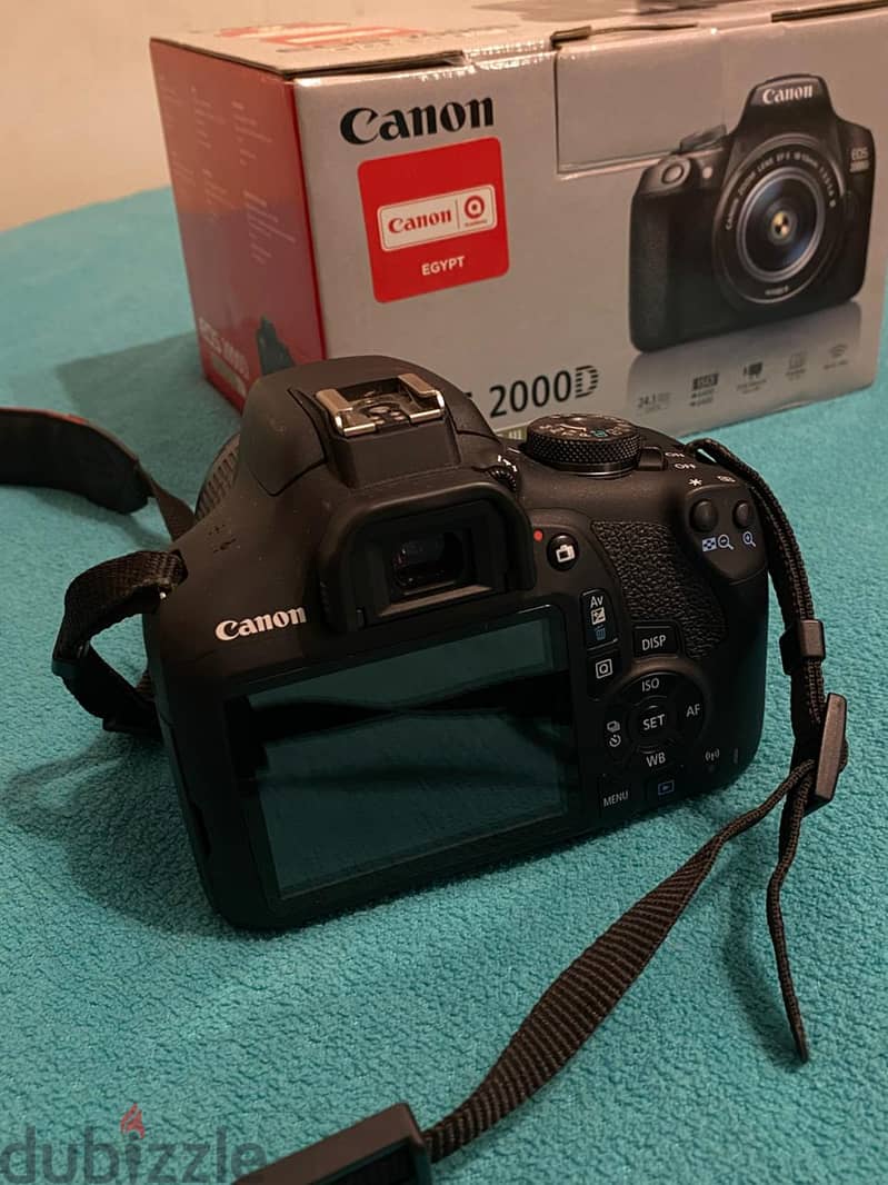 Canon EOS 2000D with zoom lens EF-S 18-55mm kit lens 2