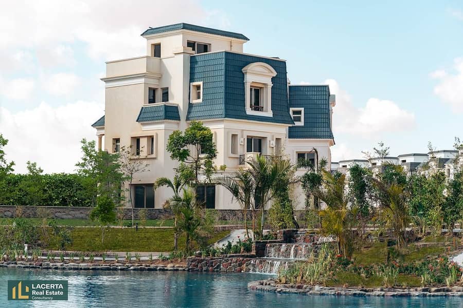 Villa in Kings Way Mountain View on the artificial lakes at the entrance to Sheikh Zayed 4 9