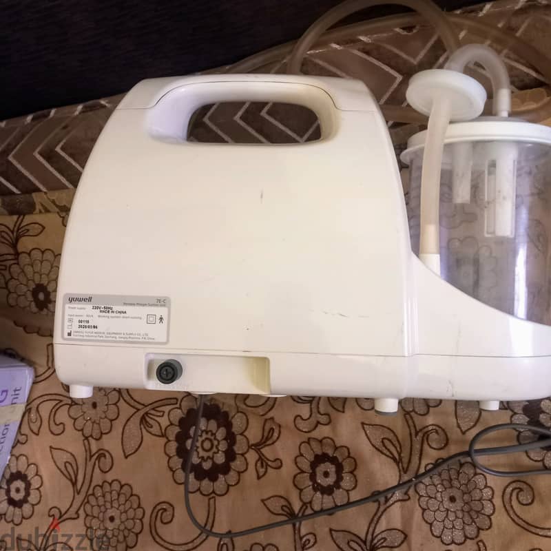 جهاز portable phegm suction unit ماركة yuwell بحالته بالكرتونه 2