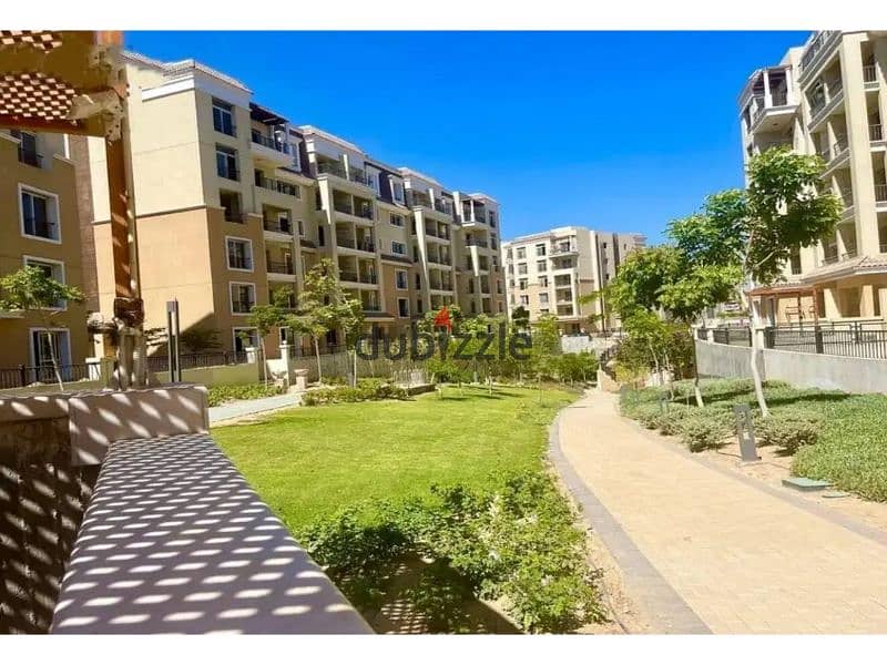 Apartment 129m with private garden, immediate delivery, double view, with down payment and installments in Sarai Compound, Mostakbal City 3