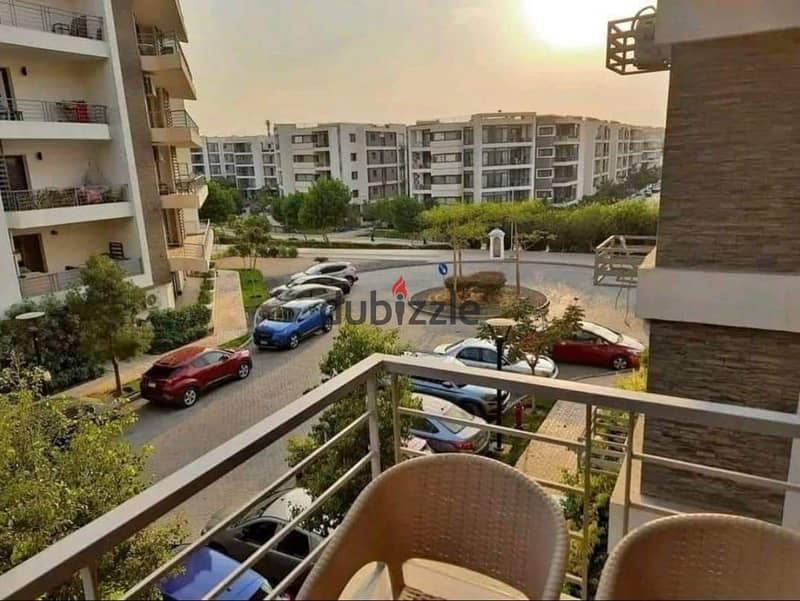 Apartment for sale with a private roof in Tah City Compound, with a down payment of 967 thousand 8