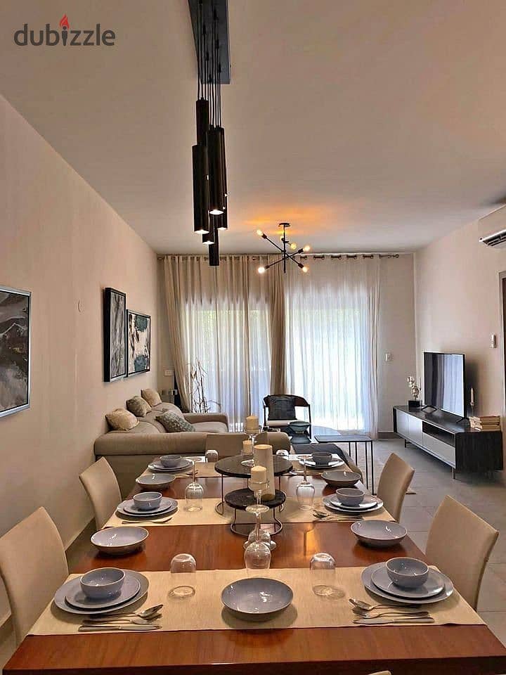 Ready-to-move-in apartment, ready for viewing, with super luxury finishing for sale in Al Brouj compound, near the airport. 4