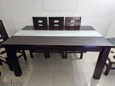 سفره خشب زان قابله للطي مع ٨ كراسيDining table with 8 chairs