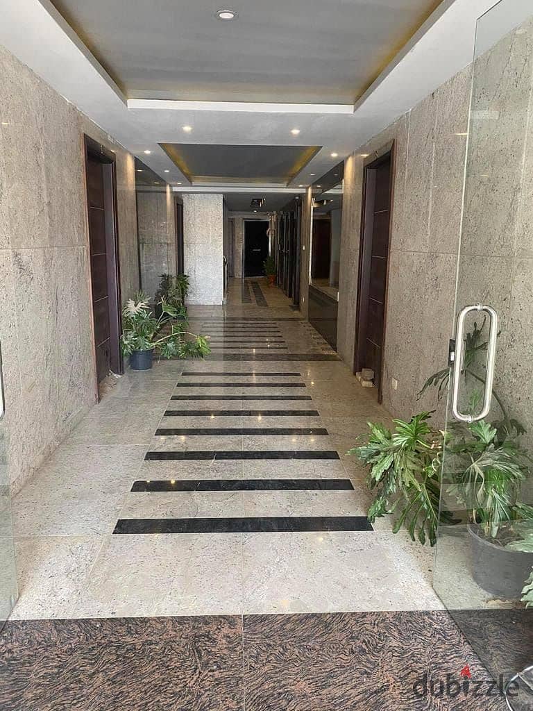 apartment with garden for sale ( ready to move & fully finished ) in galleria moon valley compound , golden square , 5th settlements 7