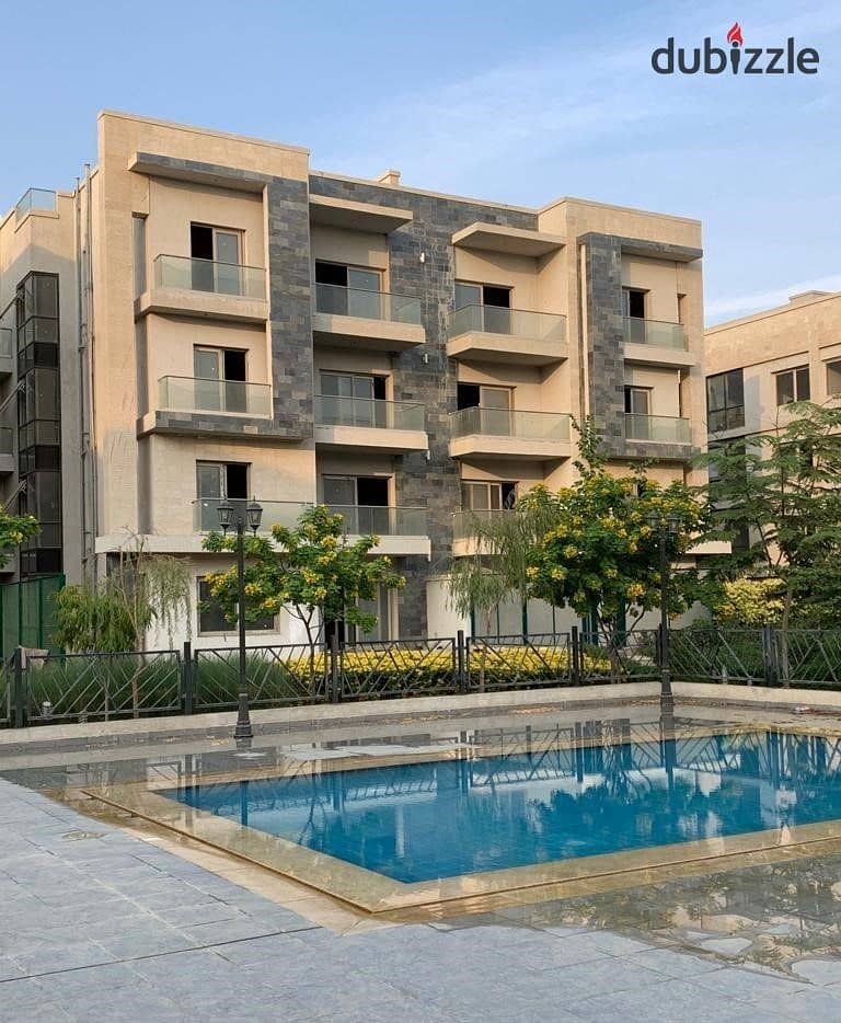 apartment with garden for sale ( ready to move & fully finished ) in galleria moon valley compound , golden square , 5th settlements 9