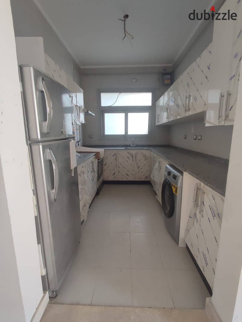 studio for rent Semi-furnished in Village Gate compound with kitchen, air conditioners and kitchen appliances at a snapshot price 1