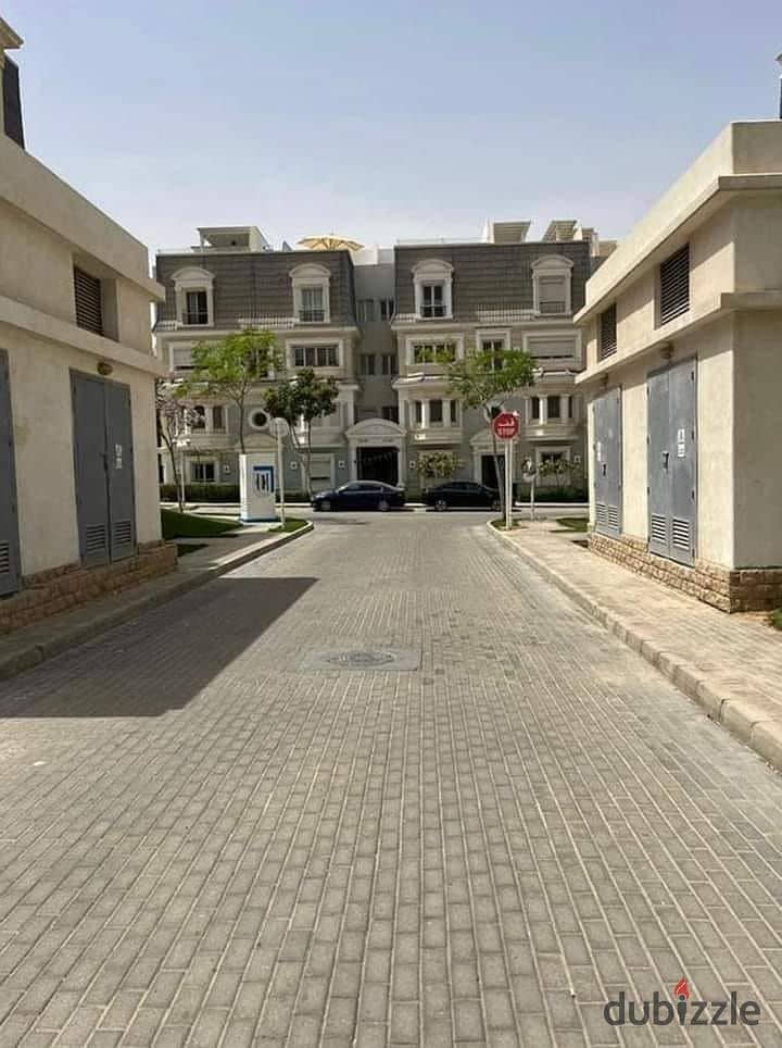 I live in a 225-meter villa behind Mall of Arabia, Mountain View iCity October, Northern Expansions, minutes from Sheikh Zayed Shooting Club 1