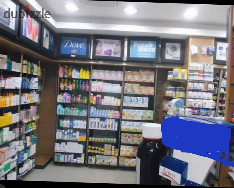 Pharmacy Fully finished and Rented in main street in Makram Ebeid Extension 6