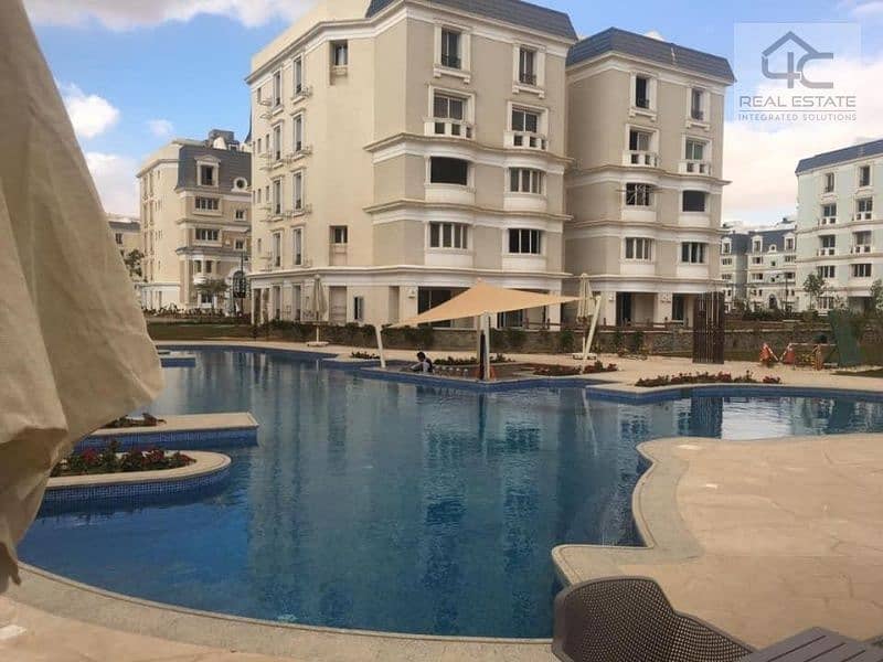 With the lowest down payment and installments, a 165 sqm double view apartment, one year’s receipt, in Mountain View iCity Compound 0