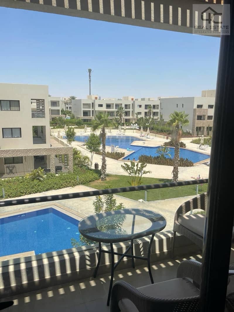 WITH the lowest price in Azha, own a finished duplex with AC and a kitchen,  double view on the largest Crystal Lagoon and directly to the sea 2