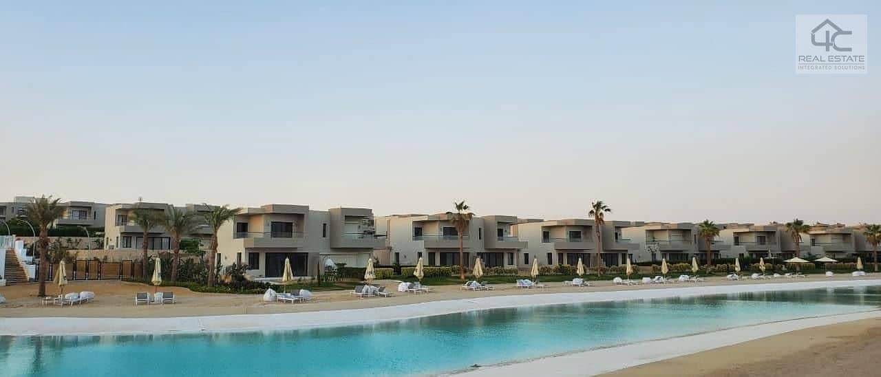 WITH the lowest price in Azha, own a finished duplex with AC and a kitchen,  double view on the largest Crystal Lagoon and directly to the sea 5