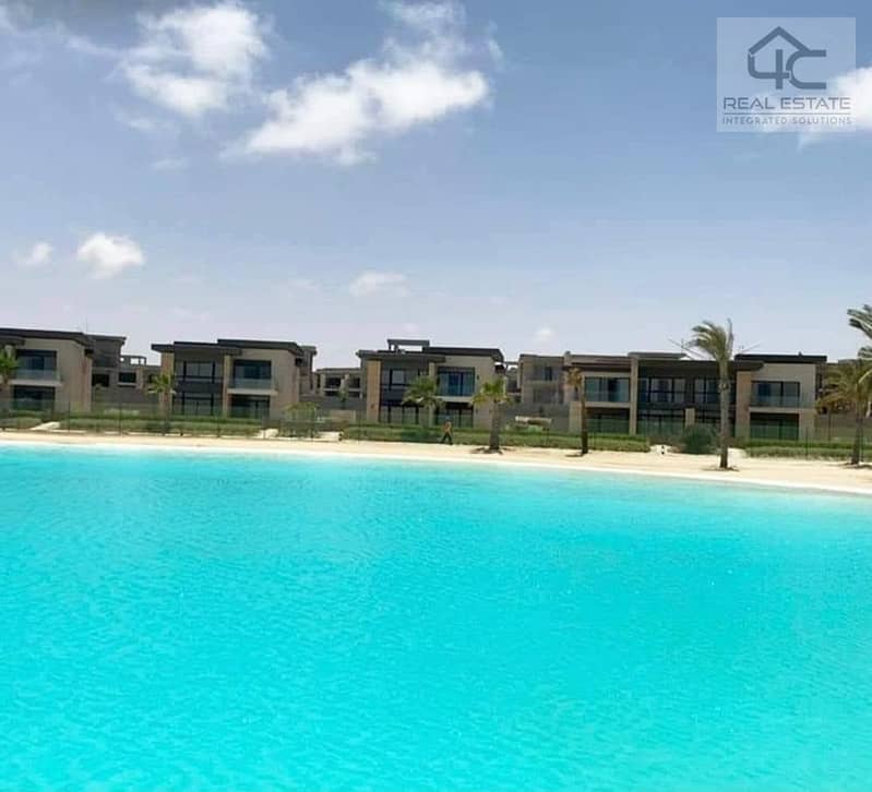 WITH the lowest price in Azha, own a finished duplex with AC and a kitchen,  double view on the largest Crystal Lagoon and directly to the sea 24