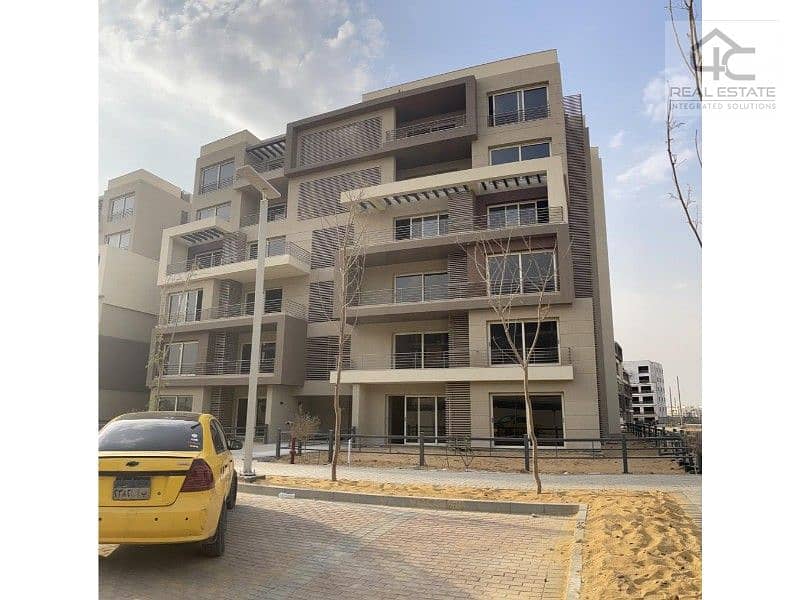 Apartment ready to move with garden open to the largest landscape area in a prime location in New Cairo. 0