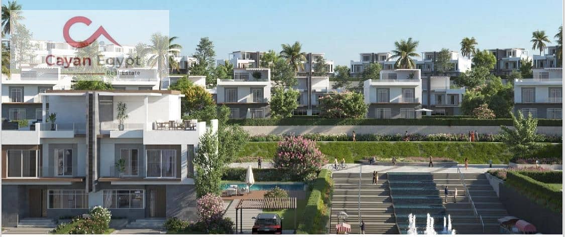 Townhouse villa with an area of ​​240 m, with a down payment starting from 5% and installments up to 8 years, next to Al-Ahly Club, Layan Compound and 1