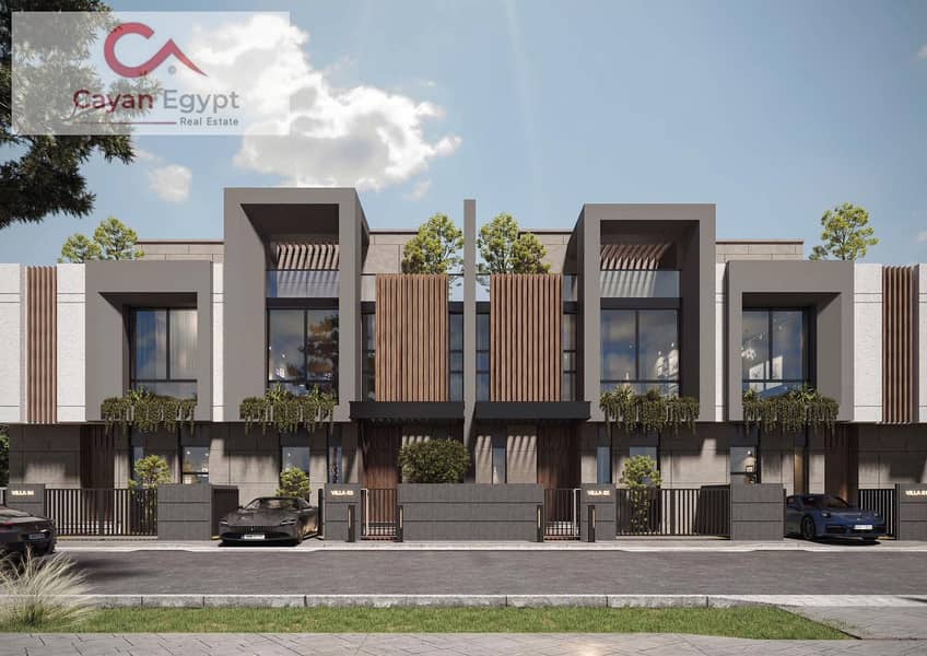 Townhouse villa with an area of ​​240 m, with a down payment starting from 5% and installments up to 8 years, next to Al-Ahly Club, Layan Compound and 2