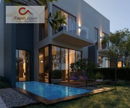 Townhouse villa with an area of ​​240 m, with a down payment starting from 5% and installments up to 8 years, next to Al-Ahly Club, Layan Compound and 3