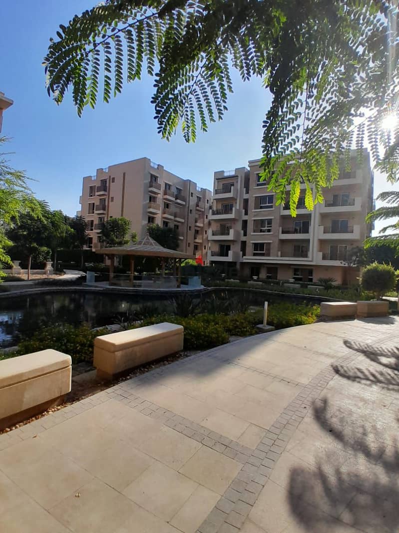 Own the last 2-bedroom apartment + garden 68 m with a golf view in Taj City, minutes from Heliopolis 5