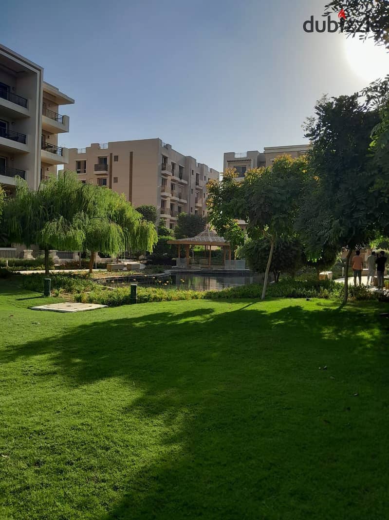 Own the last 2-bedroom apartment + garden 68 m with a golf view in Taj City, minutes from Heliopolis 6