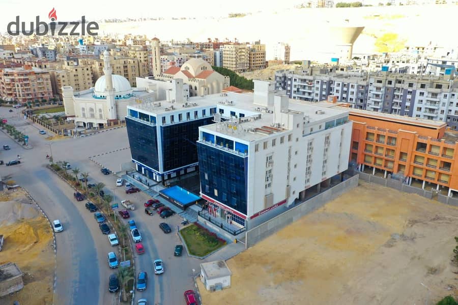 Clinic for rent, 113 meters, finished, on the front of a mall in Mokattam 4