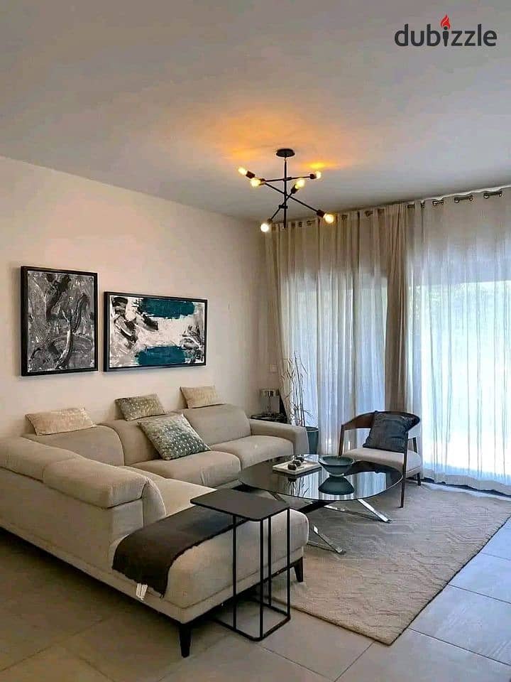 A 3-bedroom apartment, fully finished with super lux standards, for sale near Cairo International Airport in Al Brouj Compound. 4