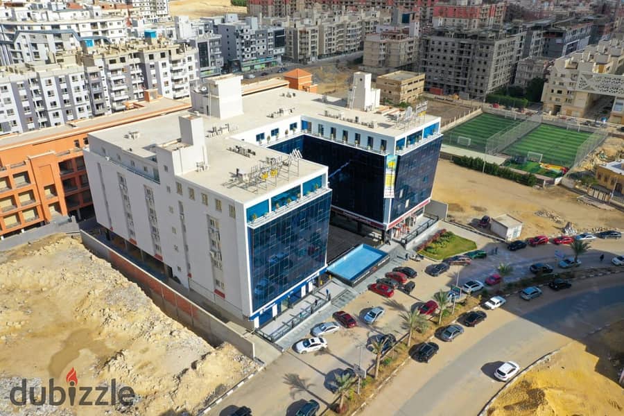 Medical center for rent, 113 meters, finished, view on the front of a mall in Mokattam 4