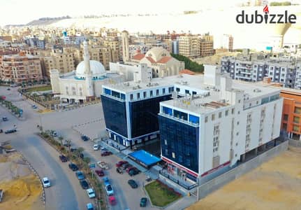 Administrative headquarters for rent, 113 meters, finished, with a view on the front of a mall in Mokattam