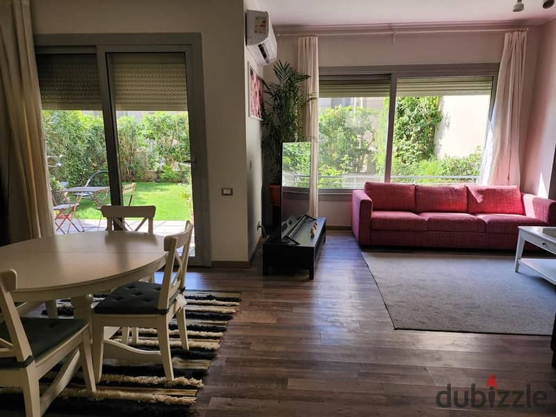 Fully furnished Apartment with garden modern finishing, for rent in Village Gate Compound 12