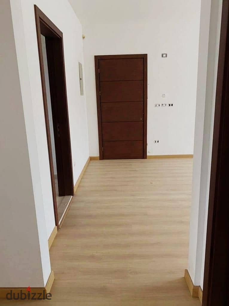 View and live immediately in a fully finished apartment with a garden in installments in Sheikh Zayed next to MOUNTAIN VIEW and GRAND HEIGHTS in KAYAN 3