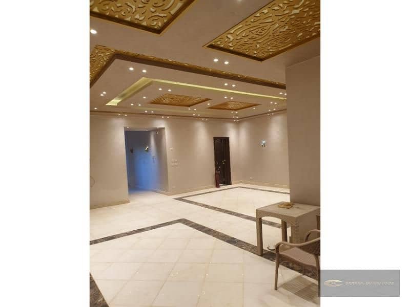 For Sale: Stand Alone Villa in Grand Heights, Sheikh Zayed" Property Features:**  - Land Area: 570 m²    - Built Area: 350 m²    - Garden: 300 m² 3