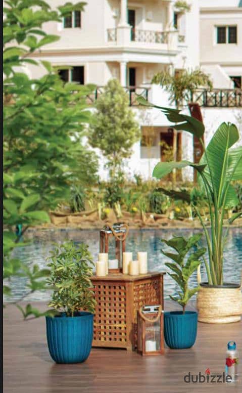 Live in an apartment with a garden, in installments over 8 years, Prime Lotion, in the heart of old Sheikh Zayed, next to ETAPA 7