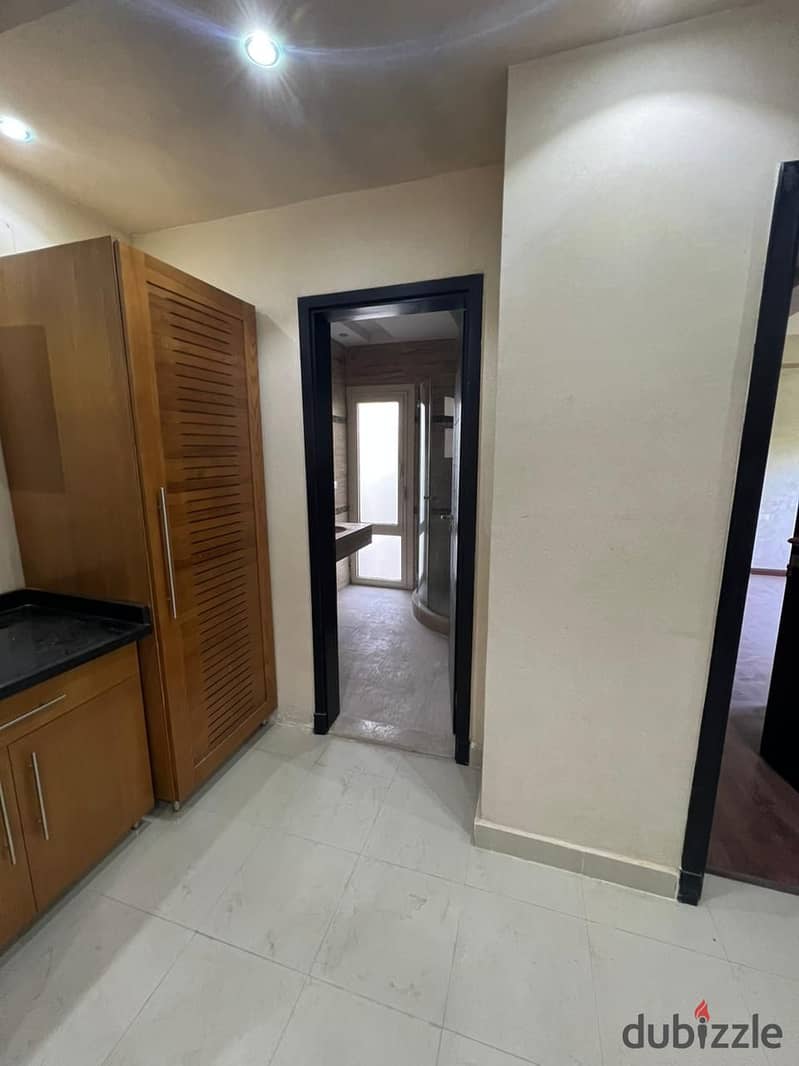 202 sqm apartment for rent in The Address Compound, Sheikh Zayed, finished with air conditioners, decking, kitchen, and garden, 350 sqm, special locat 1