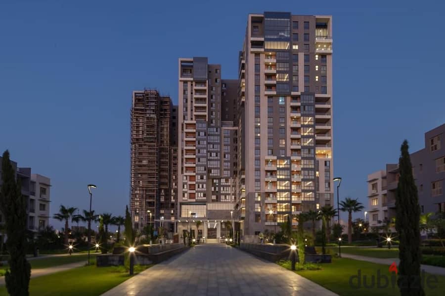 View and live immediately in MRAKEZ in a fully finished apartment with air conditioners, in installments, in a prime location in Sheikh Zayed 1