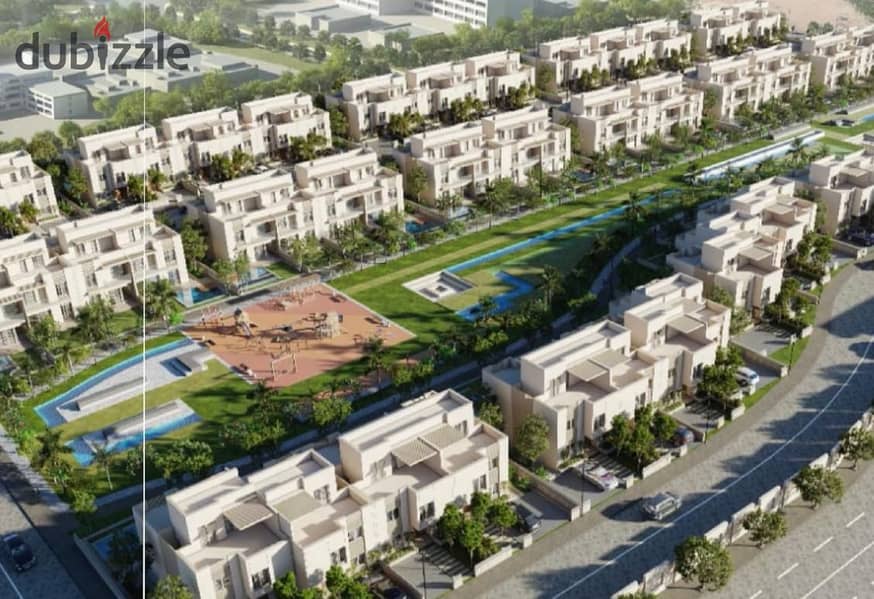 Live directly on the Dahshour Link in a three-story villa available for installment over 8 years in Sheikh Zayed at West End. 7