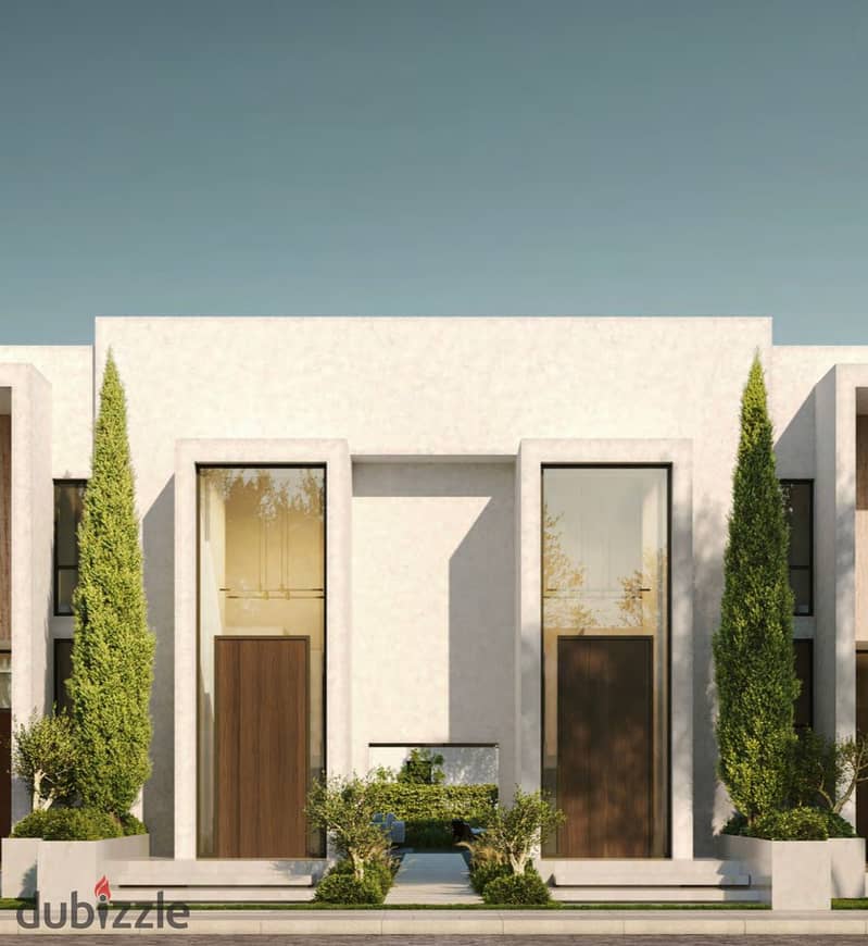 Live in a villa with a private swimming pool, in installments over 9 years, in a prime location in Sheikh Zayed, next to SODIC, in HILLS OF ONE 10