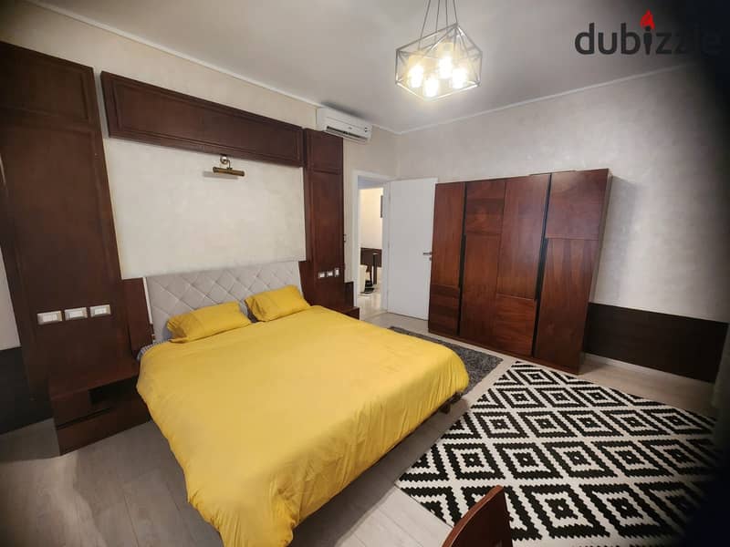 Furnished studio with garden rent Village Gate Palm Hills New Cairo 0